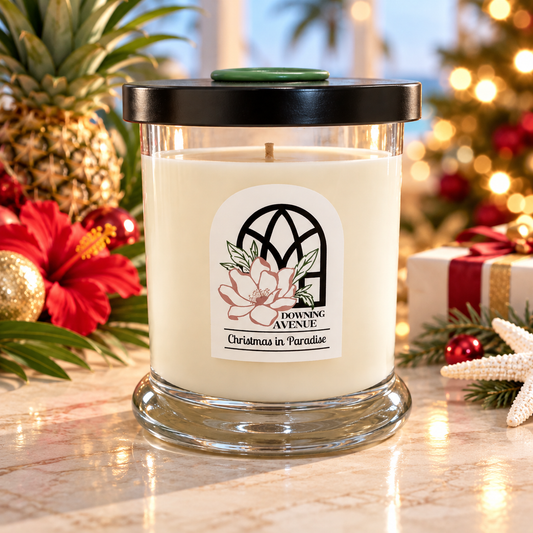 Christmas in Paradise hand-poured candle by Downing Avenue, black lid with green wax seal