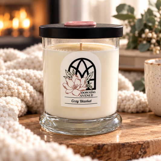 Cozy Blanket hand-poured candle by Downing Avenue, black lid with pink wax seal