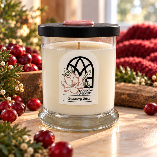 Cranberry Bliss hand-poured candle by Downing Avenue, black lid with pink wax seal