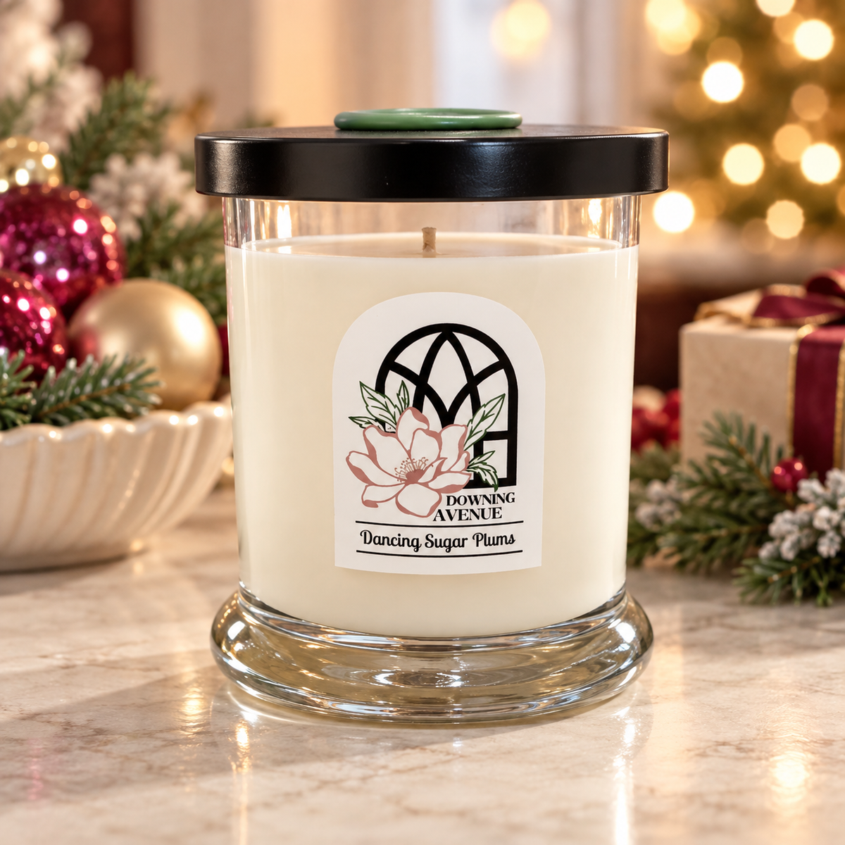 Dancing Sugar Plums hand-poured candle by Downing Avenue, black lid with green wax seal