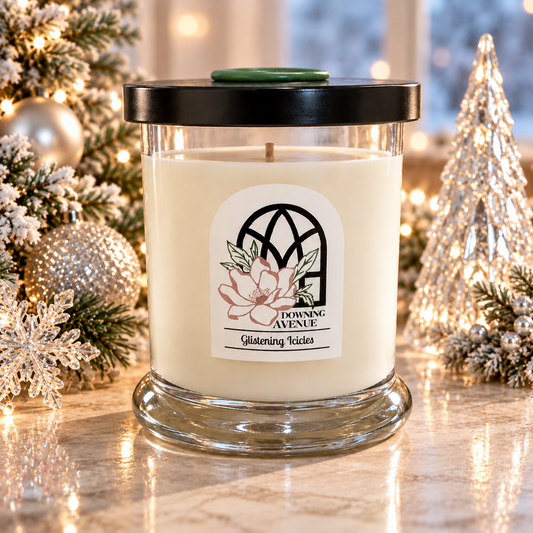 Glistening Icicles hand-poured candle by Downing Avenue, black lid with green wax seal