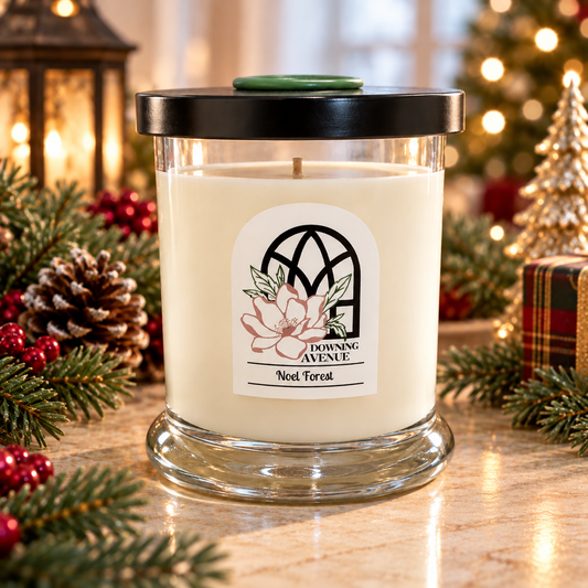 Noel Forest hand-poured candle by Downing Avenue, black lid with green wax seal