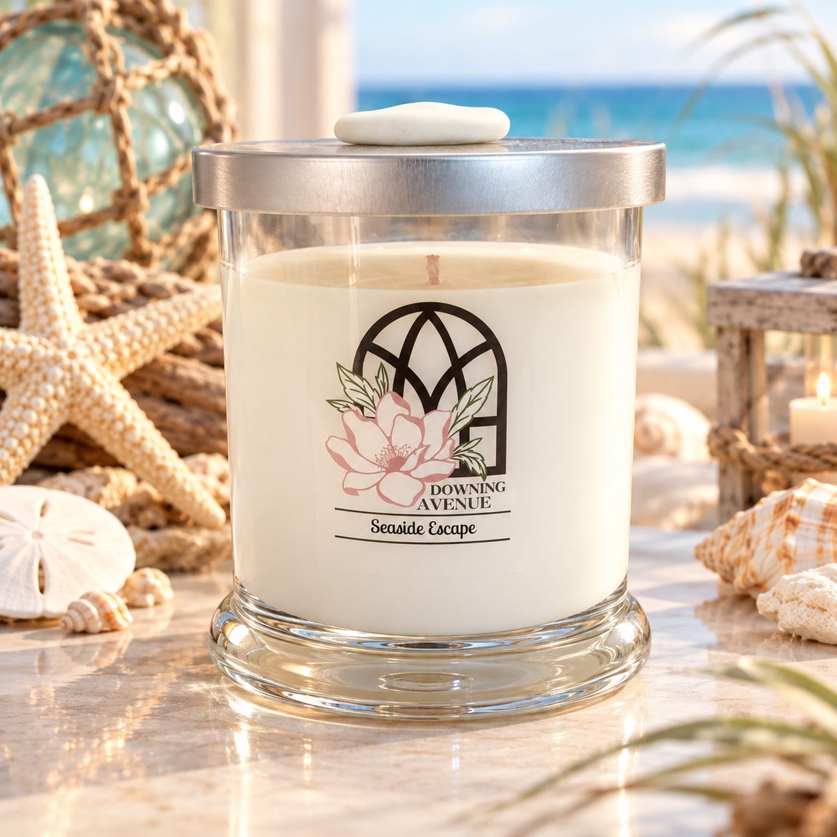 Seaside Escape hand-poured candle by Downing Avenue, silver lid with stone topper