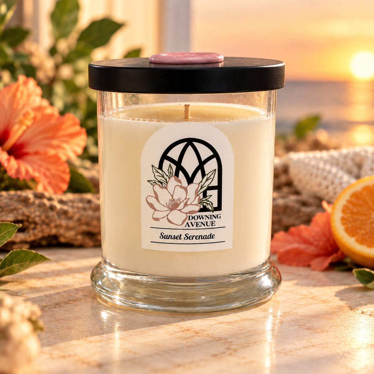 Sunset Serenade hand-poured candle by Downing Avenue, black lid with pink wax seal